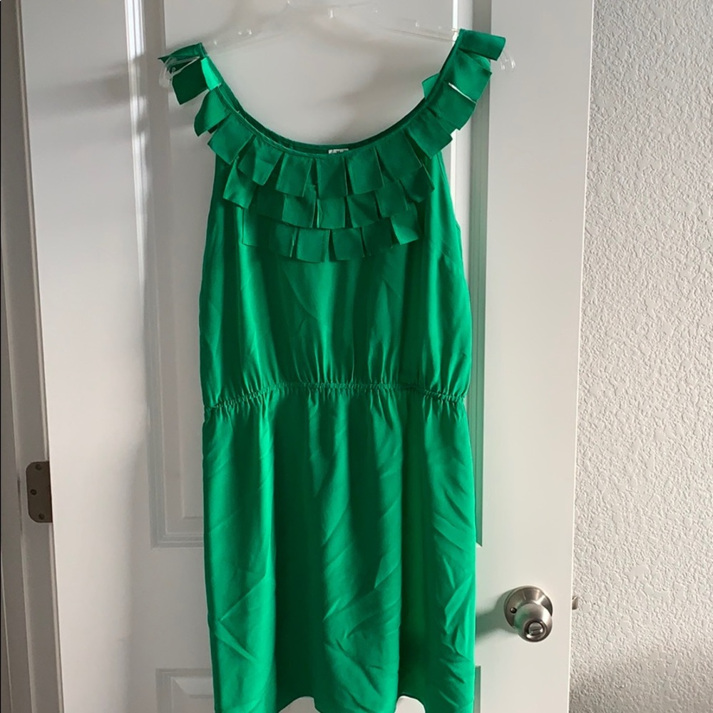 Green silk dress with unique shoulder detail